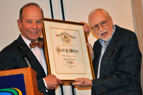 David Wolper, right, receives the William May Garland Award from SCCOG Chairman Barry Sanders.